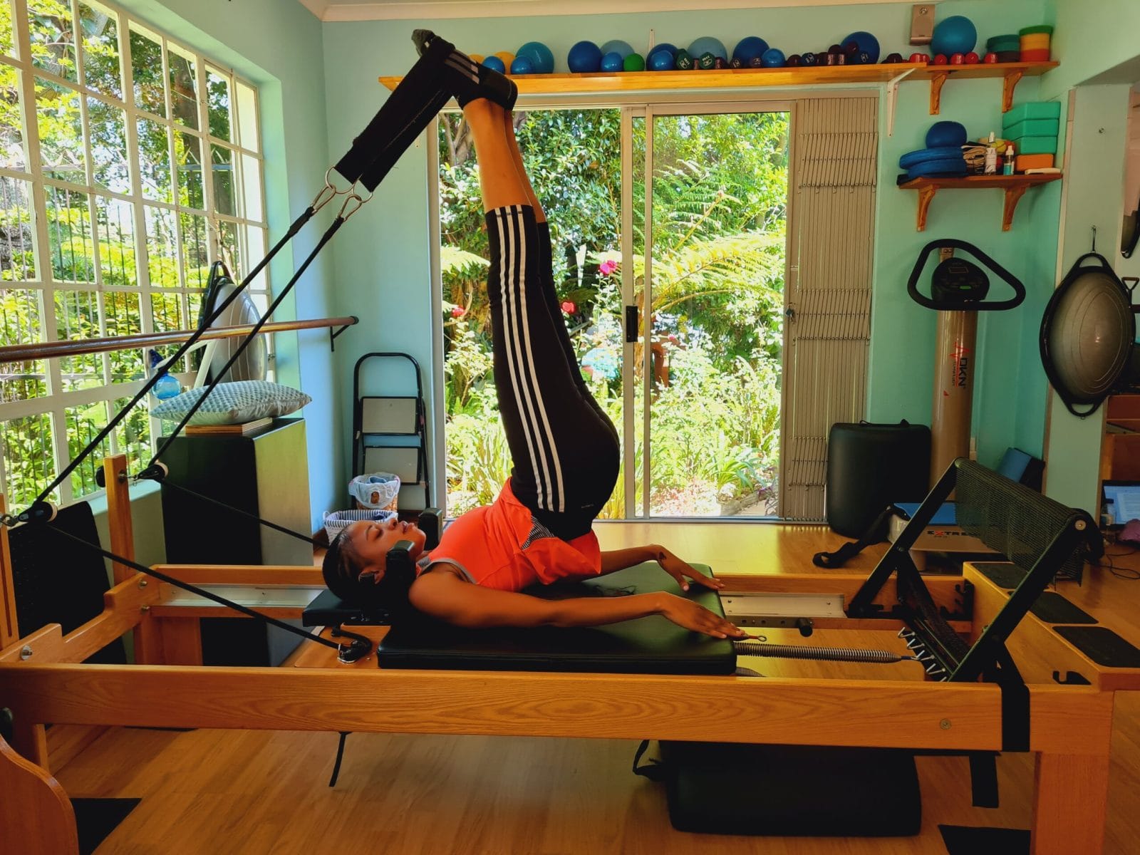 20220125_104022 Woman performing Reformer Pilates